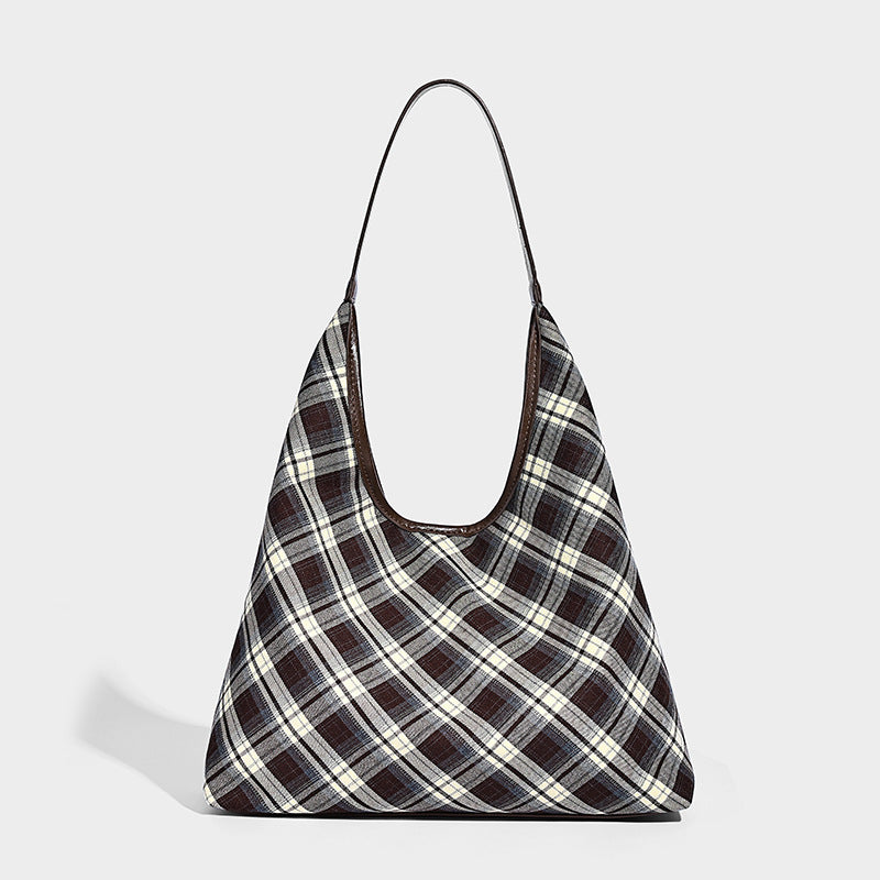Slouchy hobo shoulder bag in dark brown, cream, and gray plaid with deep brown leather-look trim and single long shoulder