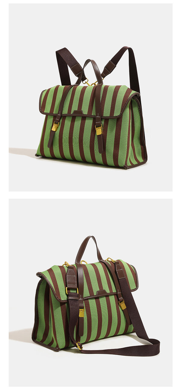 Structured striped canvas convertible satchel bag with leather-look trim, gold-tone buckle hardware, and backpack straps