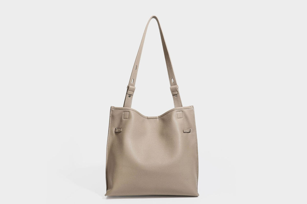 Pebbled leather-look tote bag with front toggle hardware and long shoulder strap, detail view 22