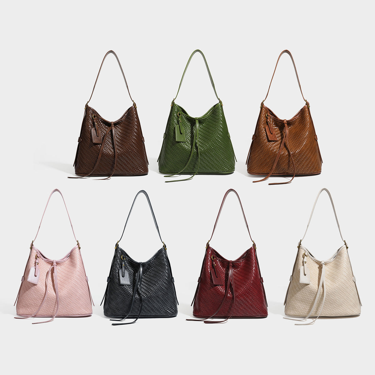 Slouchy woven leather-look shoulder bag with tie closure, gold-tone hardware, and single shoulder strap, detail view 2