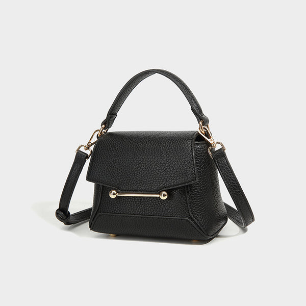 Small structured pebbled flap mini satchel with gold-tone bar hardware, short top handle, and detachable crossbody strap