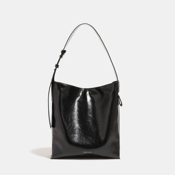 Glossy leather-look oversized shoulder tote bag with wide flat strap and soft rectangular silhouette, detail view 6