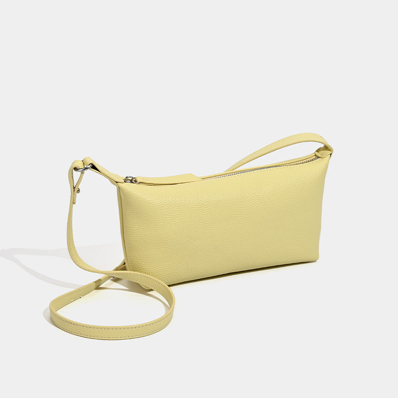 Small pebbled zip-top hobo bag with detachable adjustable strap and silver-tone hardware, detail view 3