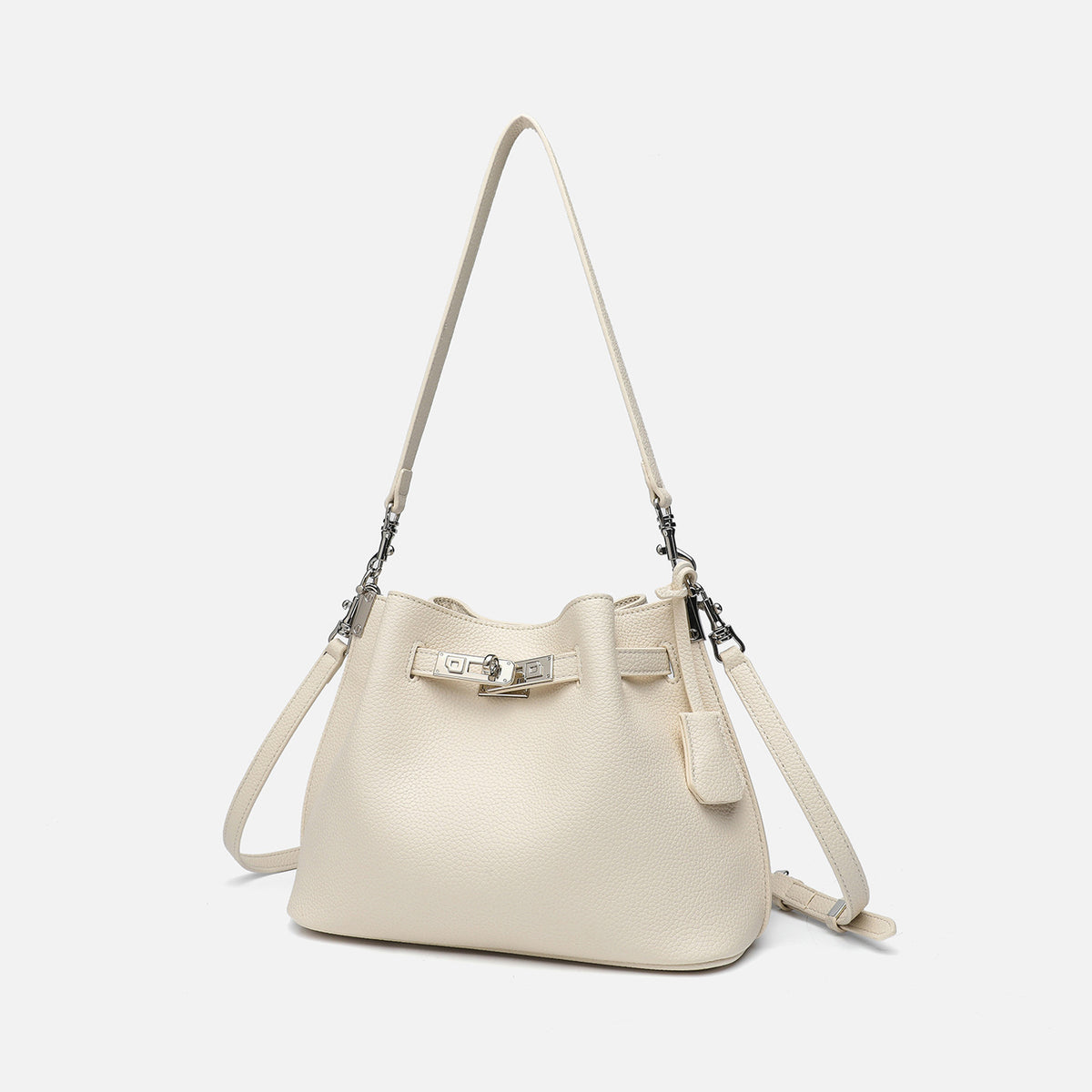 Soft-structured pebbled leather-look bucket bag with silver turn-lock front clasp and adjustable crossbody strap, detail view