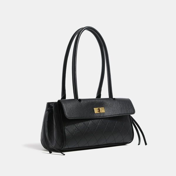 Structured quilted diamond-stitch baguette handbag with gold-tone turn-lock closure and dual top handles, detail view 3
