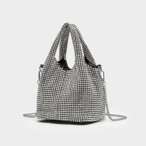 Small all-over rhinestone crystal bucket bag with twin handles and detachable chain shoulder strap, front view