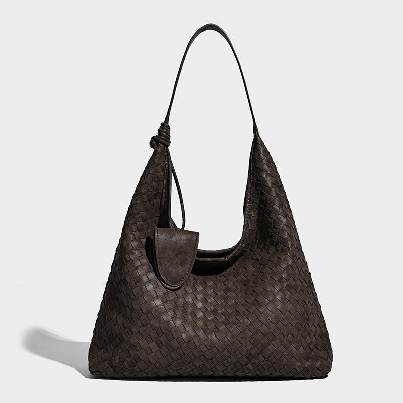 Slouchy woven hobo shoulder bag with knotted strap and matte leather-look textured finish, detail view 6