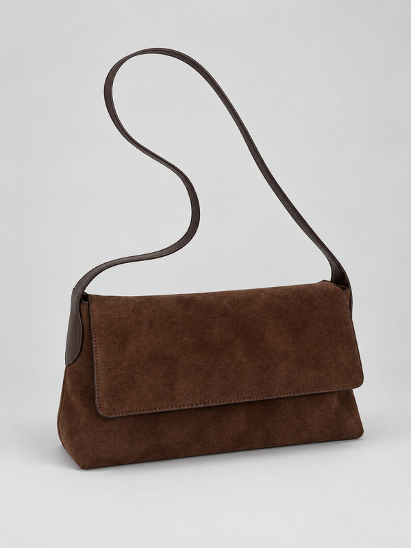 Rectangular matte suede-finish flap shoulder bag with slim dark strap and gold-tone turn-lock hardware, detail view 16