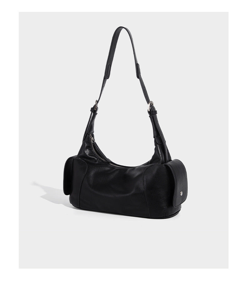 Soft pebbled leather-look hobo shoulder bag with zip top closure, side flap pockets, and silver-tone hardware, detail view 9