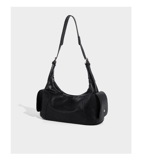 Soft pebbled leather-look hobo shoulder bag with zip top closure, side flap pockets, and silver-tone hardware, detail view 9