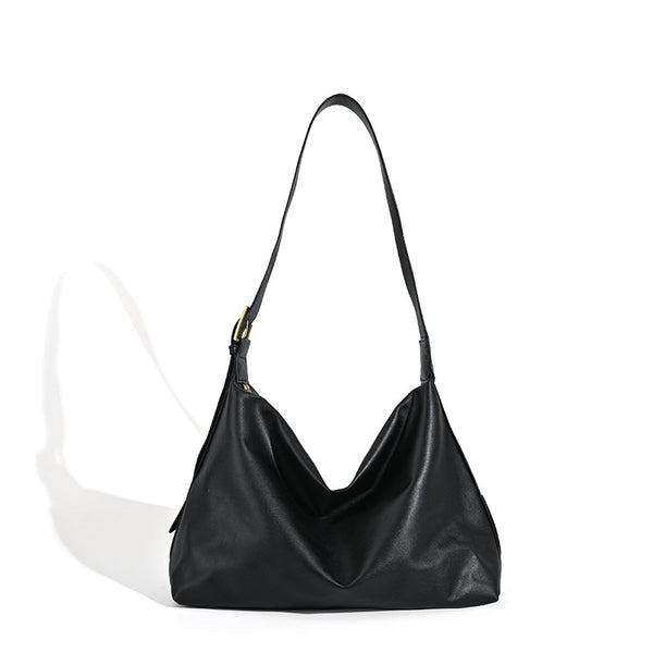 Large slouchy hobo shoulder bag in smooth black leather-look finish with gold-tone buckle hardware and adjustable strap