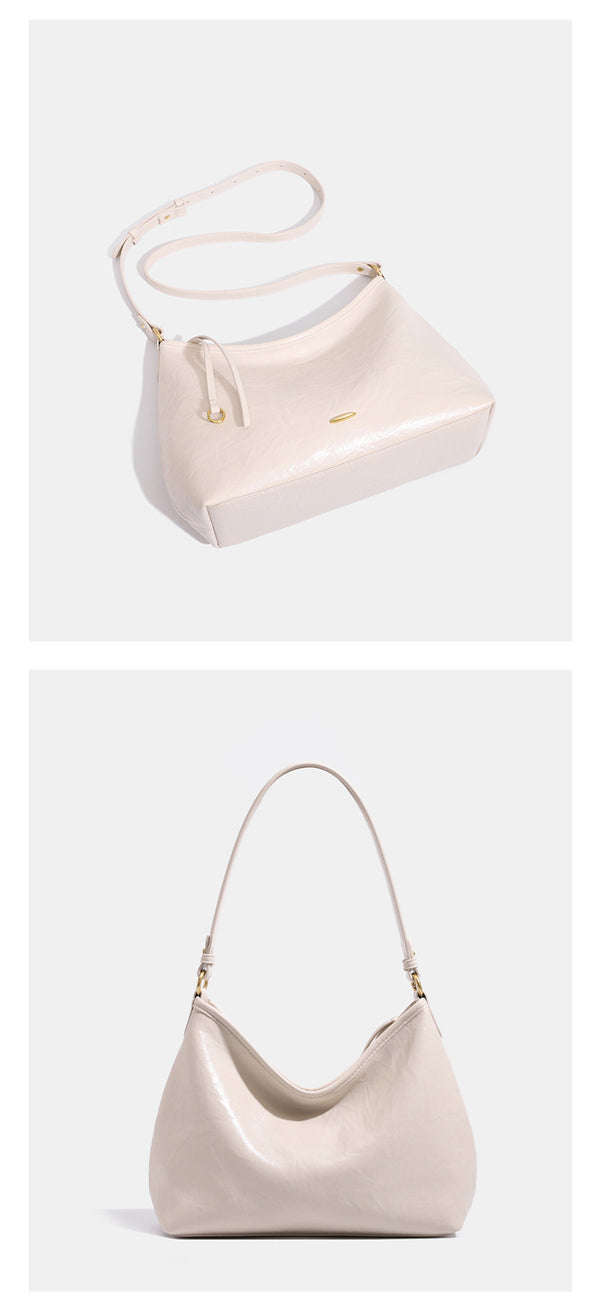 Large crinkled leather-look hobo shoulder bag with zip closure and gold-tone hardware, detail view 18