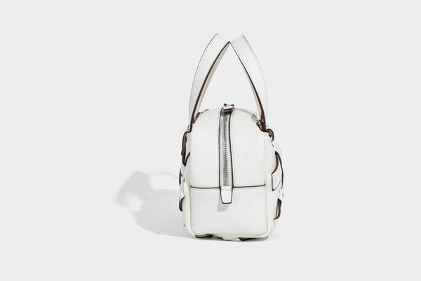 Kleine, strukturierte wandelbare Henkeltasche mit gewebten Einsätzen, kontrastierender Paspelierung, silberfarbenem Reißverschluss und abnehmbarem, Detail