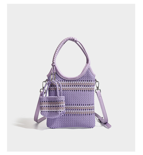 Brown two-tone woven leather-look shoulder bag with braided top handles, detachable mini pouch, and adjustable crossbody