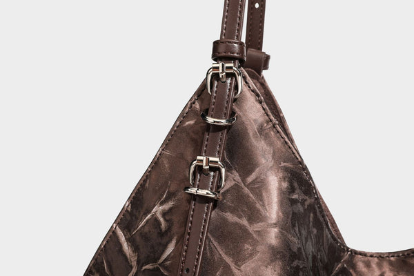 Slouchy crinkle-finish shoulder tote bag with silver hardware and attached zip pouch, detail view 29