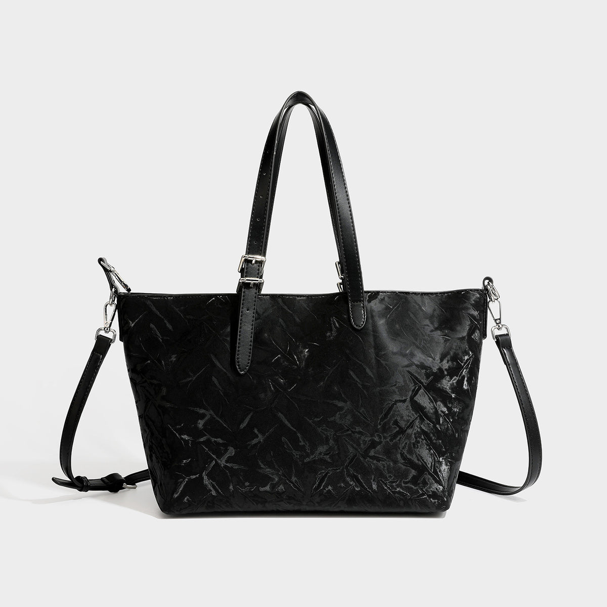 Glossy crinkled metallic-finish tote bag in brown with smooth leather-look top handles, silver-tone hardware, and attached