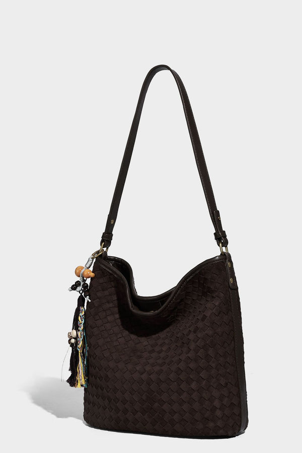 Dark chocolate woven texture hobo shoulder bag with multicolor tassel-and-bead charm and long adjustable strap, detail view