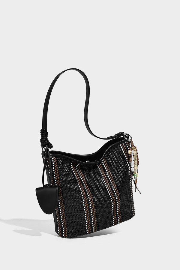 Woven bucket shoulder bag with leather-look trim, silver-tone hardware, and beaded tassel charm, detail view 27
