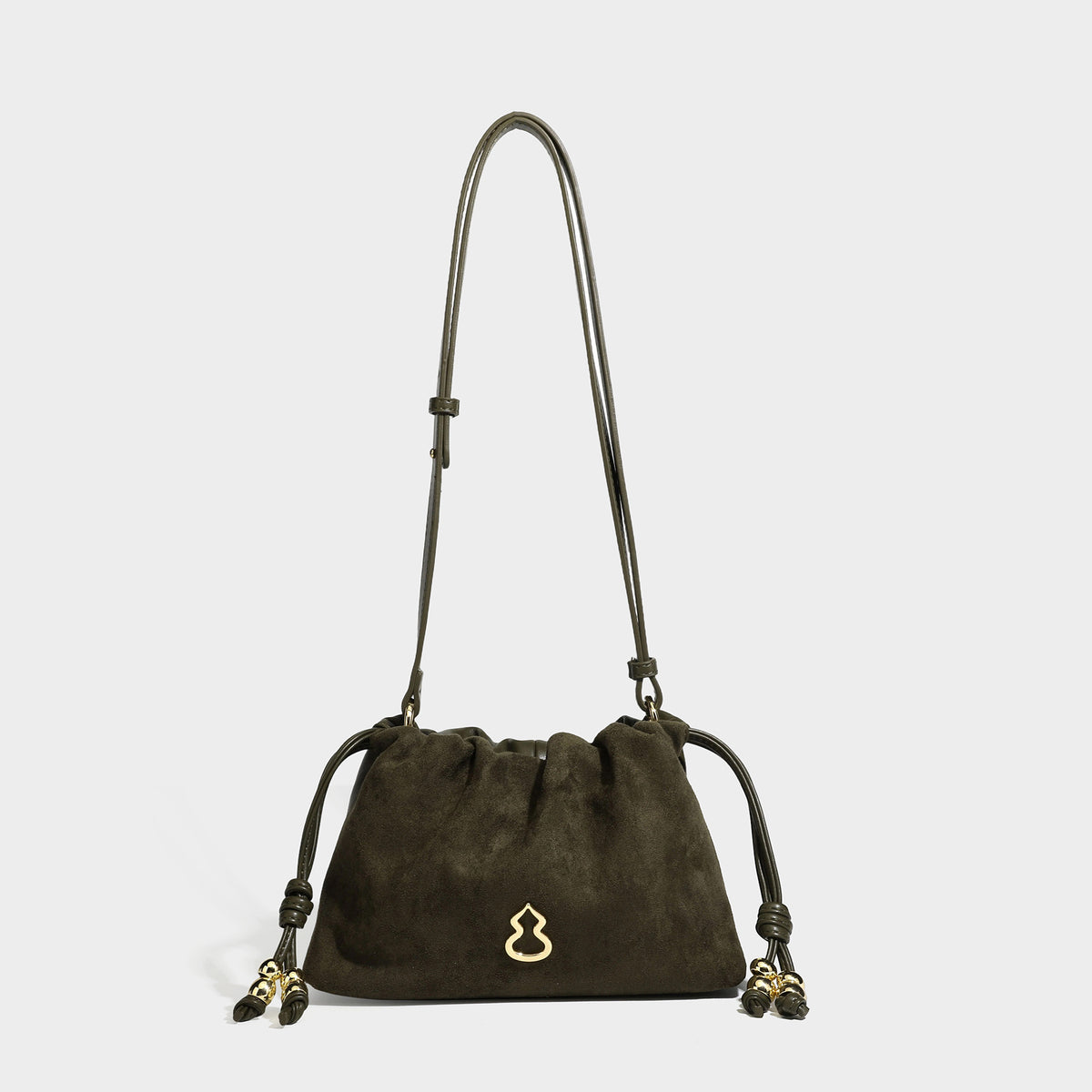 Suede-look drawstring shoulder bag in brown with smooth trim, knotted bead drawstring closure, slim adjustable strap, and