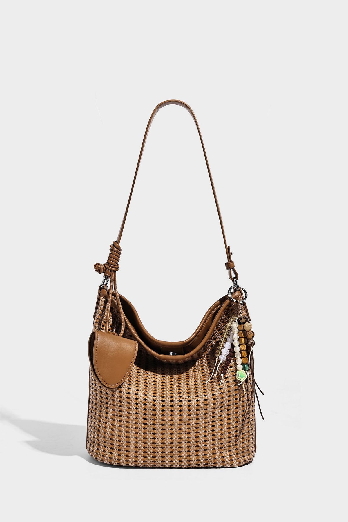 Slouchy open-weave hobo shoulder bag with leather-look trim, beaded tassel charm, and adjustable strap, detail view 19