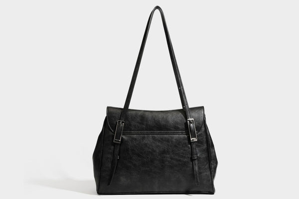 Structured flap-top shoulder tote bag in distressed leather-look finish with silver-tone buckle hardware and double shoulder