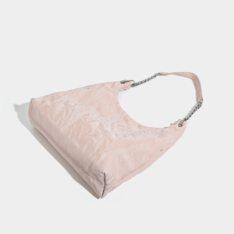 Large embossed leather-look shoulder tote bag with silver-tone chain strap, detail view 4