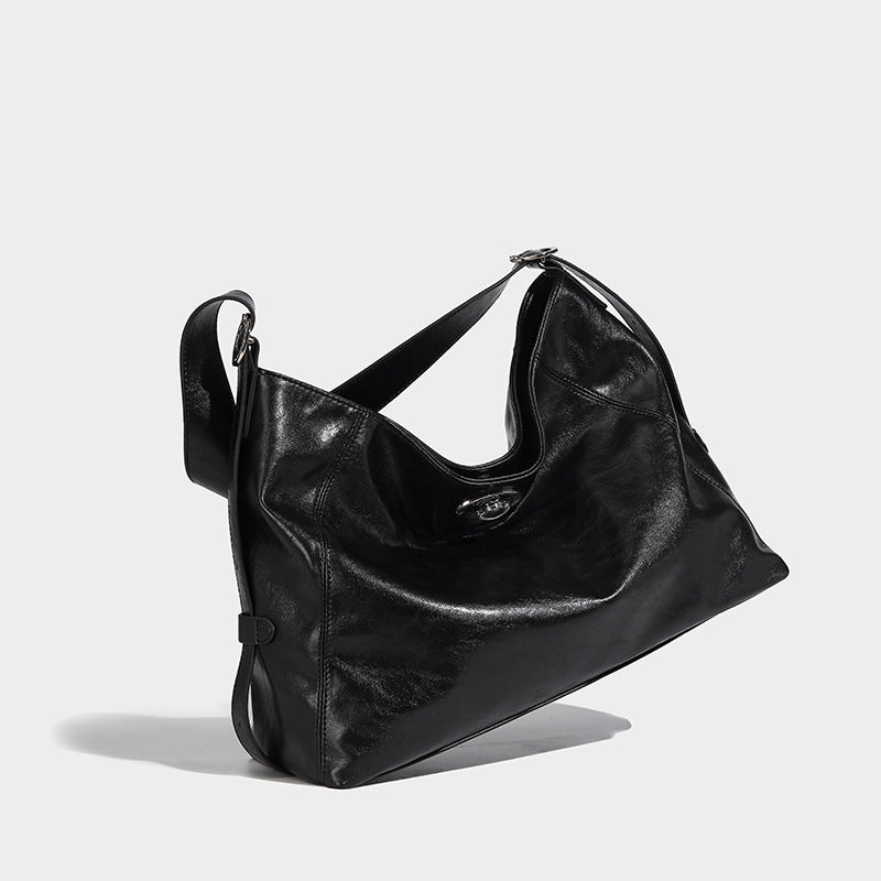 Slouchy hobo shoulder bag with turn-lock flap closure and adjustable strap, detail view 30