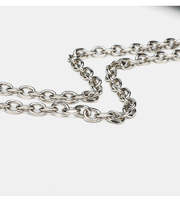 Structured rectangular flap crossbody bag with rhinestone bow and silver chain strap in pebbled finish, detail view 17