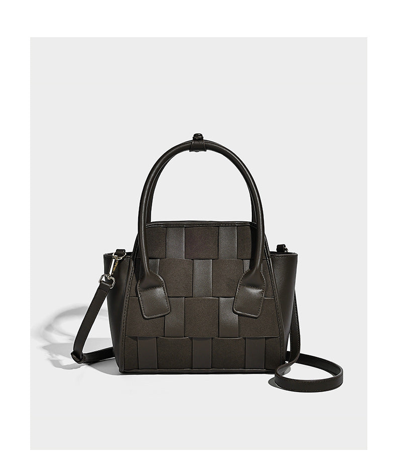 Small structured woven-panel mini tote bag with double top handles and detachable crossbody strap in matte leather-look