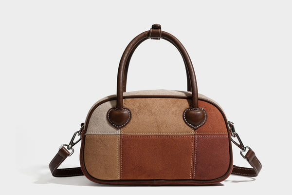 Kleine, strukturierte Henkeltasche aus Patchwork in Farbblöcken aus Beige, Camel, Braun und Rost mit dunkelbrauner Einfassung, herzförmigem