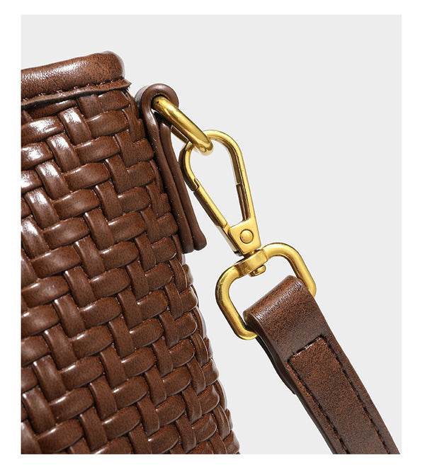Woven leather-look tote bag in mocha brown with knotted top handle, front flap pocket, and detachable crossbody strap with