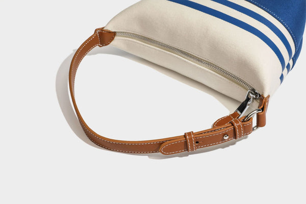 Cremefarbene und blau gestreifte Canvas-Schultertasche mit Träger in Lederoptik und Reißverschluss in Silberoptik, Detailansicht 26