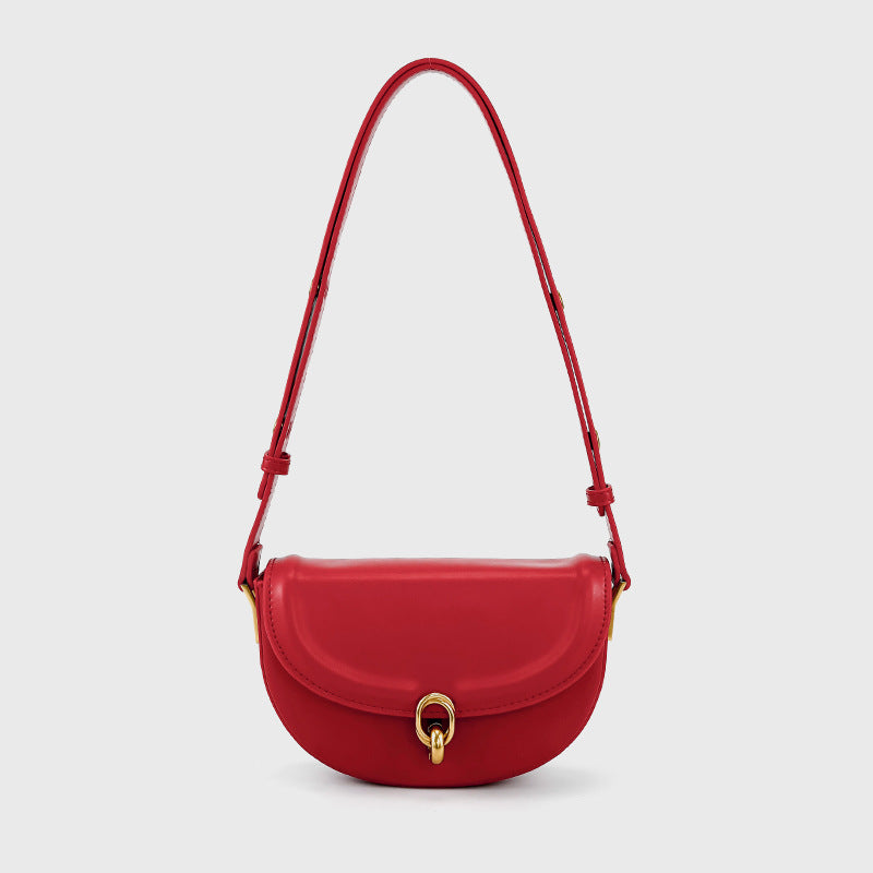 Mini black leather-look saddle bag with gold-tone carabiner clasp and adjustable shoulder strap, detail view 4