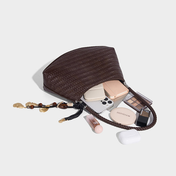 Woven leather-look hobo shoulder bag with braided strap and silver-tone hardware, detail view 4