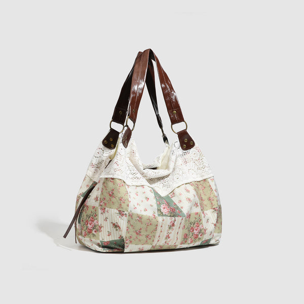 Cream floral patchwork hobo tote bag with crochet lace trim and brown leather-look shoulder straps, detail view 2