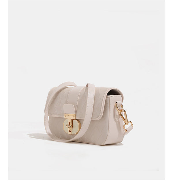 Compact rectangular quilted flap crossbody bag with gold-tone turn-lock closure and chain strap, detail view 13