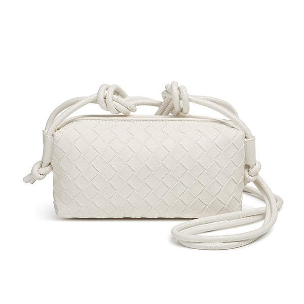Small rectangular woven-texture mini crossbody bag with knotted rope strap and gold-tone zip closure, detail view 11