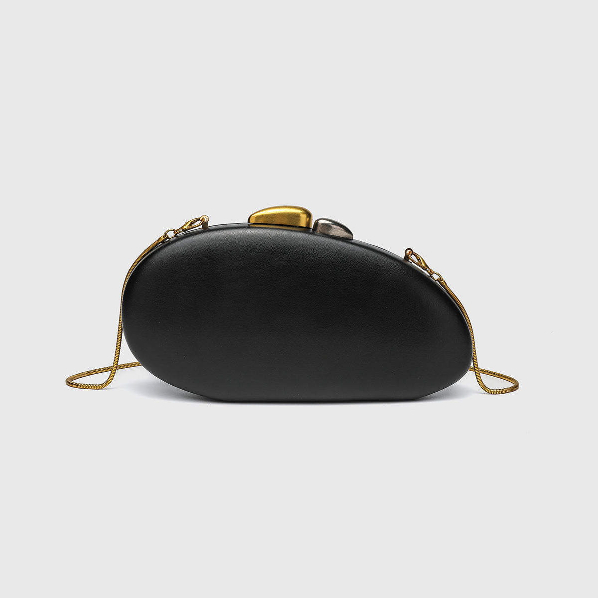 Oval hard-shell crossbody clutch bag with smooth matte leather-look finish and gold-tone snake chain strap, detail view 7