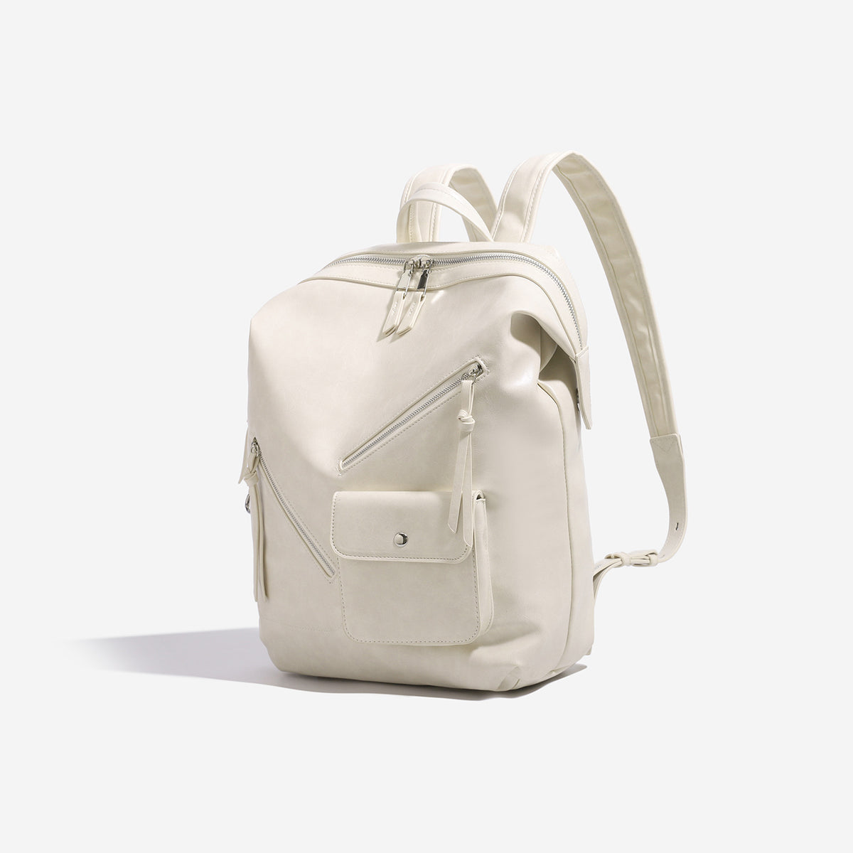 Structured smooth leather-look backpack handbag with dual top zip closure, diagonal front zip pocket, snap-flap mini pocket
