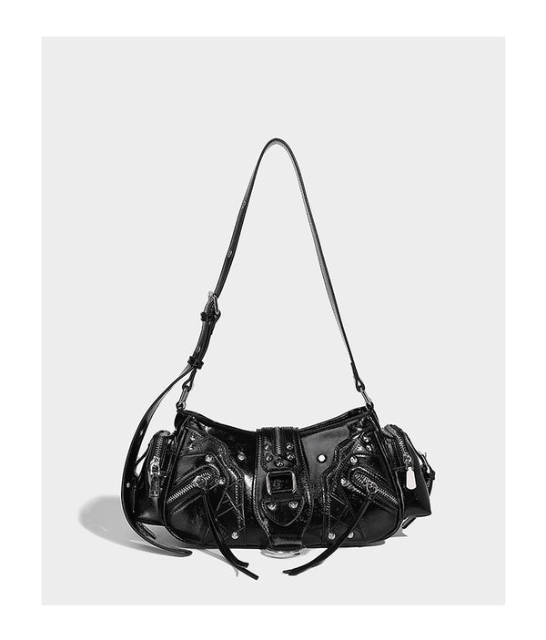 Compact glossy leather-look crossbody bag with silver studs, buckle hardware, and multiple zip pockets, detail view 9