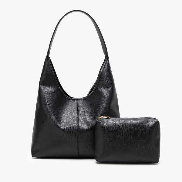 Large slouchy hobo shoulder bag in pebbled matte leather-look finish with single flat strap, detail view 4