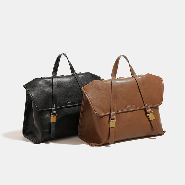 Strukturierter wandelbarer Rucksack in Denim-Optik mit Besätzen in Cognac-Lederoptik, Schnallenbeschlägen in Goldoptik und Tragegriff oben