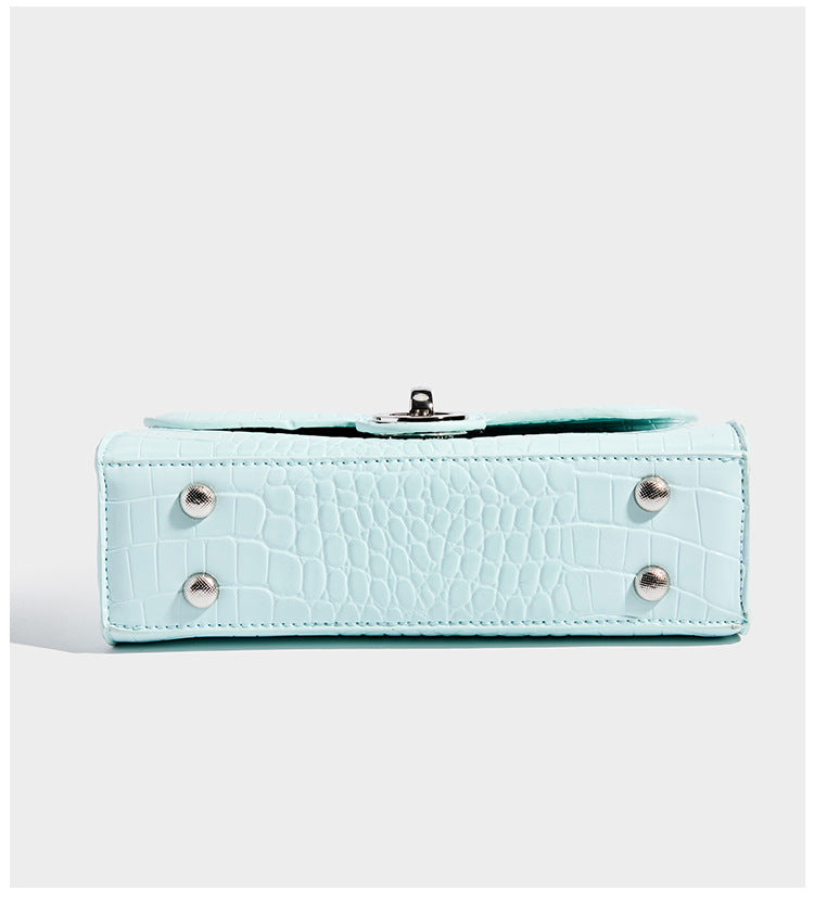 Mini croc-embossed glossy structured handbag with silver-tone turn-lock clasp and short top handle, detail view 14