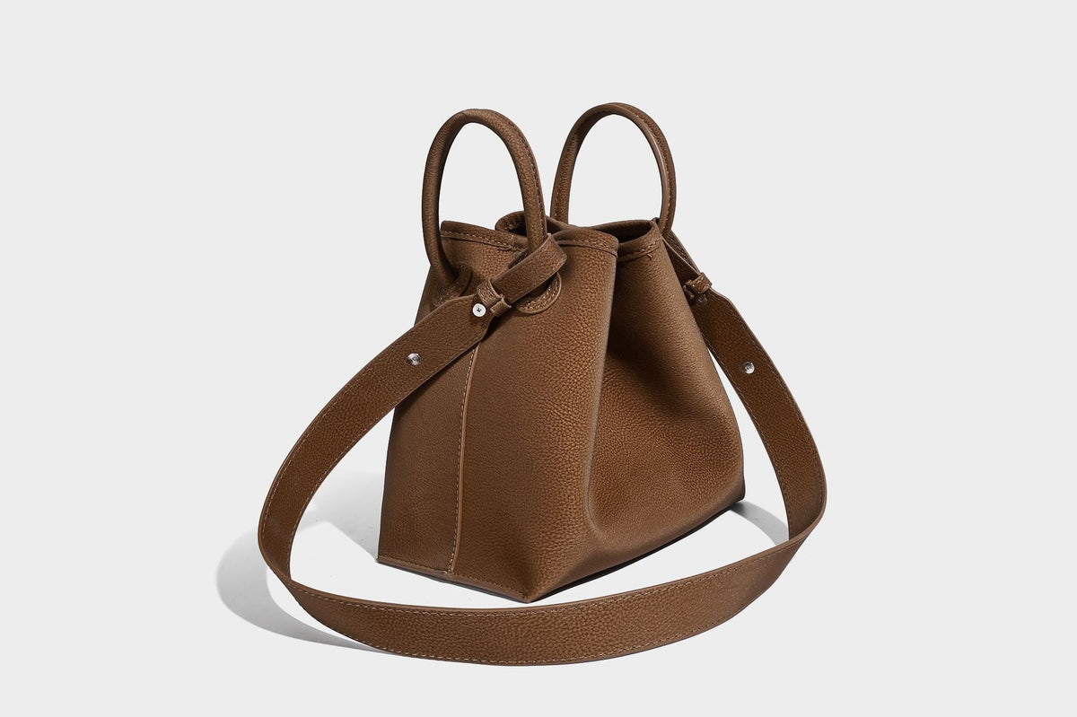 Small structured matte pebbled tote bag with twin top handles and removable zip pouch, detail view 31