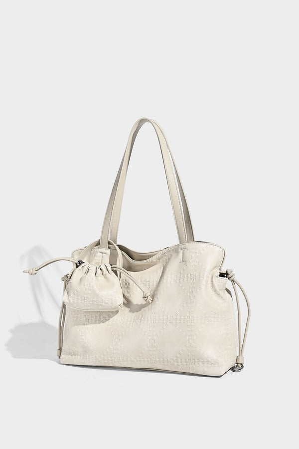 Große Tote-Schultertasche aus geprägtem Lederimitat in Elfenbein-Creme mit zwei langen Riemen, seitlicher Kordelraffung und abnehmbarem