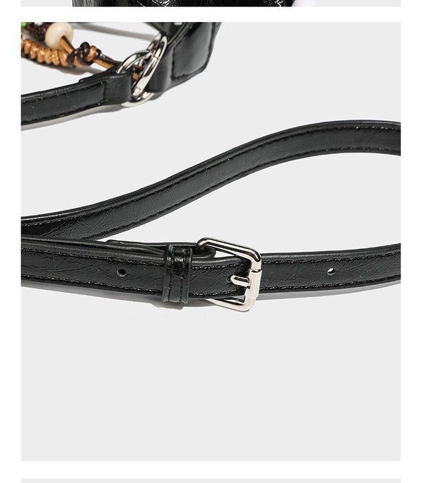 Lässig fallende Hobo-Schultertasche in Halbmondform mit glänzender, geknautschter Lederoptik, schmalem Riemen, silberfarbenen Ringbeschlägen und