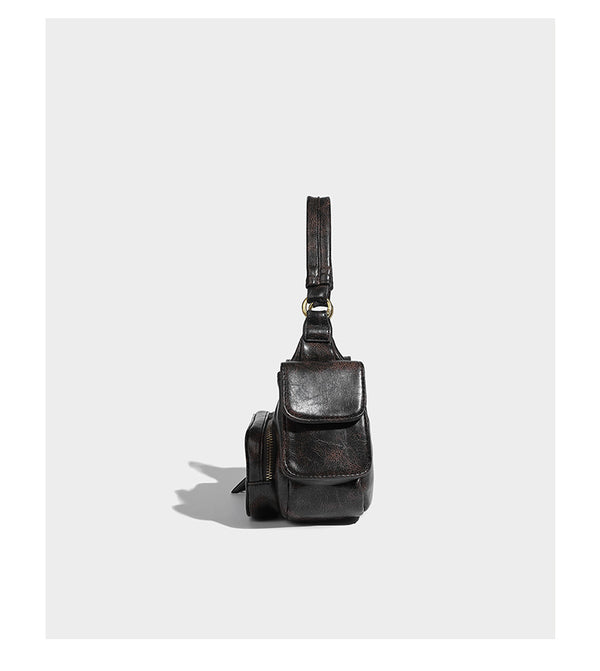 Formlose Schultertasche in Lederoptik mit mehreren Fächern, Used-Finish, vorderer Reißverschlusstasche, seitlichen Klappentaschen und goldfarbenem