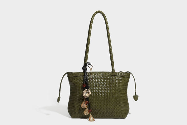 Structured woven leather-look tote bag in dark brown with long shoulder straps, side drawstring ties, and gold filigree
