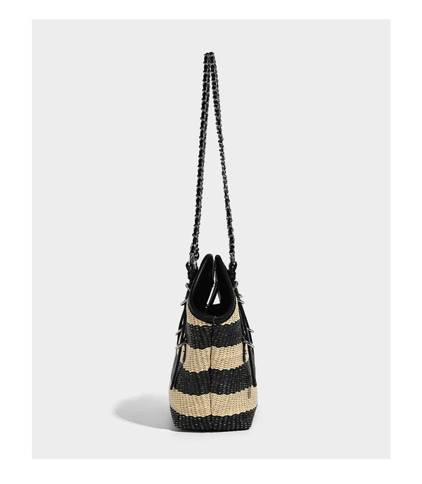 Black and natural striped woven tote bag with chain shoulder strap and silver-tone turn-lock hardware, detail view 8