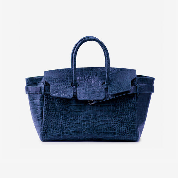Large structured tote satchel with glossy crocodile-embossed leather-look finish, dual top handles, and metal buckle flap